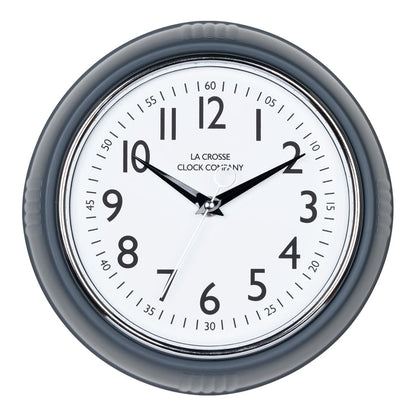 Head-on image of the 404-3024DS 9.5-inch Diner Clock – Dark Slate. The clock features a retro-style dark slate frame with a white dial, chrome bezel, black numbers and minute markings, black metal hands, and a silver second hand.