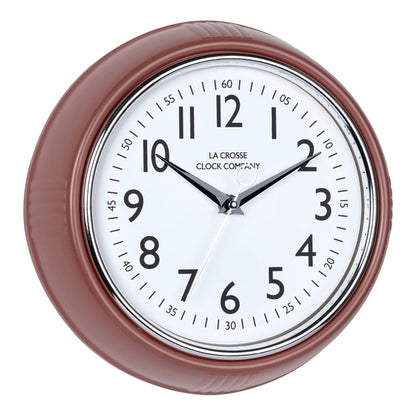 Right-facing image of the 404-3024TC 9.5-inch Diner Clock – Terracotta. The clock features a retro-style terracotta frame with a white dial, chrome bezel, black numbers and minute markings, black metal hands, and a silver second hand.