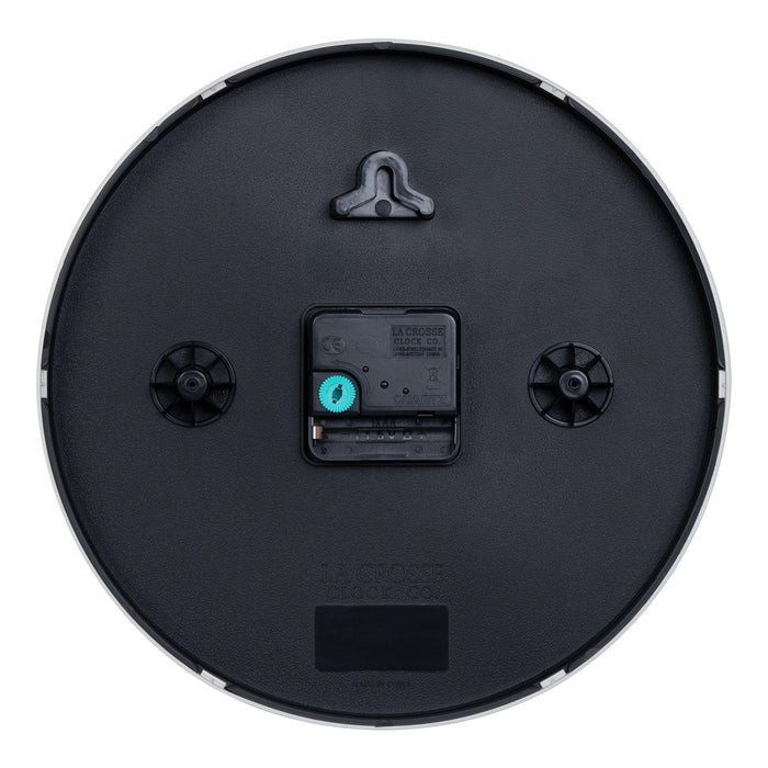 Back image of the 404-3025R 10-inch Basic Decor Wall Clock showing the hanging hole for mounting, easy set time wheel, the Quartz movement with battery compartment
