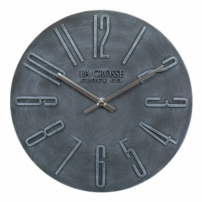 Head on image of the 404-3028B Cormac 11.02-inch Wall Clock features a bold molded three-dimensional frame with silver premium metal hands in an open-face design