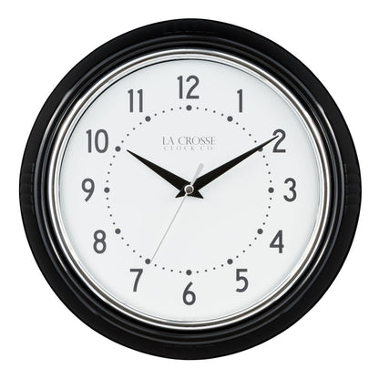 Black and white head-on image of the 404-3624B 9.5-inch Diner Wall Clock featuring a black frame with chrome bezel accent, an off-white dial with black numbers and hour dots, a silver second hand, and black hour and minute hands.