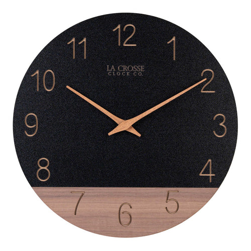 Head-on image of the 404-3630C 12-inch Sierra Wood Wall Clock - Black, the clock features a black and wood split design open-face dial, with laser cut numbers, and wood hour and minute hands.