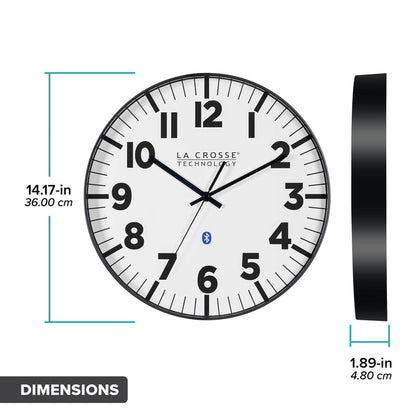 Dimension image in inches and centimeters of the 404-4536 14.2-inch Insta-Set Wall Clock with Bluetooth® Technology the clock features a white dial with bold black numbers and markings, a black flush-mount frame, and black hands measuring 14.17 in in diameter and 1.89 in in depth.