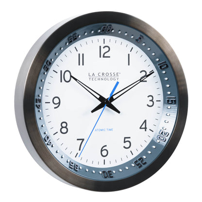 Right-facing image of the 10-inch 404-54667 Atomic Metal Wall Clock with Blue Chapter Ring. The clock features a black stainless steel frame with a blue chapter ring and raised seconds indicators, surrounding a white dial with black numbers, metal hands, and a blue accent second hand.