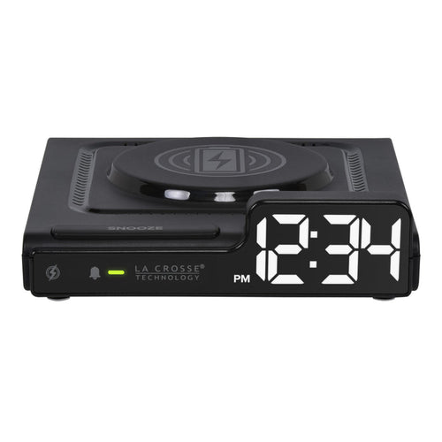 Head-on image of the 617-143 Amp Mini 15W Wireless Charging LED Alarm Clock. The alarm clock features a wireless charging pad, easy access buttons, an alarm with snooze, white time digits, and LED status light.