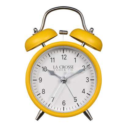 Head-on image of the 617-3314MY Metal Twin Bell Alarm Clock – Mustard Yellow, the clock features a white dial with black numbers, silver hands and accents, in a mustard yellow metal case.