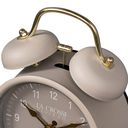 Close-up detail image of the 617-3314TP Metal Twin Bell Alarm Clock – Taupe, showing the twin bell and hammer of the alarm clock. The clock features a Taupe dial with white numbers, gold hands and accents, in a taupe metal case.