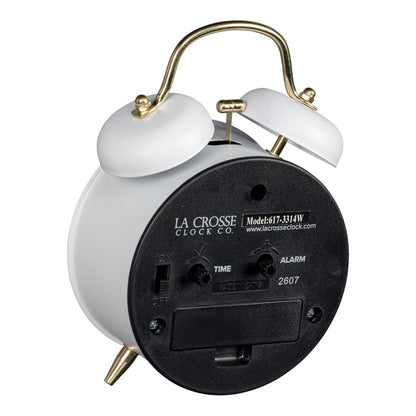 Angled back image of the 617-3314W Metal Twin Bell Alarm Clock – White, showing the battery compartment, knobs, and the on/off switch.