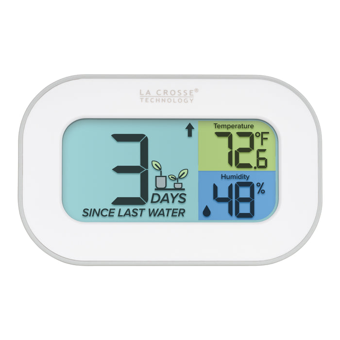 Digital plant care watering timer 919-147 white oval case with a screen with three color sections, the turquoise blue section displays how many days since the last watering with a graphic of plants and an up arrow, the yellow section lists the temperature at 72.6 degrees Fahrenheit, and the dark blue section lists the humidity level at 48 percent with a water drop icon
