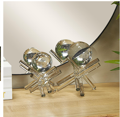 CLEAR CRYSTAL ABSTRACT JACK INSPIRED SCULPTURE WITH CLEAR RESTING ORBS,
