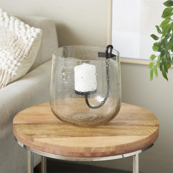 Clear Glass Decorative Candle Holder with Black Metal Accents and Brown Speckles