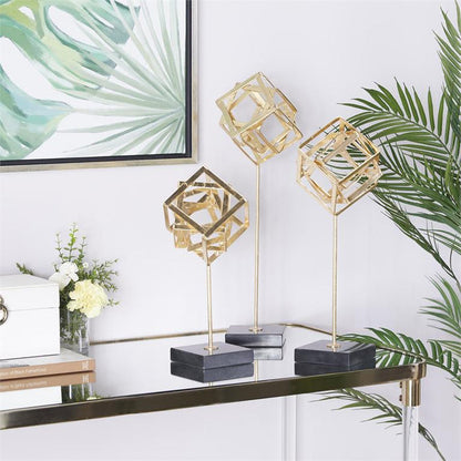 COSMOLIVING BY COSMOPOLITAN GOLD MARBLE GEOMETRIC SCULPTURE WITH MARBLE BASE