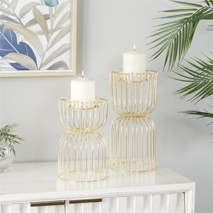 COSMOLIVING BY COSMOPOLITAN GOLD METAL PILLAR CANDLE HOLDER,
