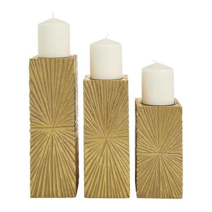 COSMOPOLITAN GOLD WOOD GEOMETRIC CARVED PILLAR CANDLE HOLDER, SET OF 3