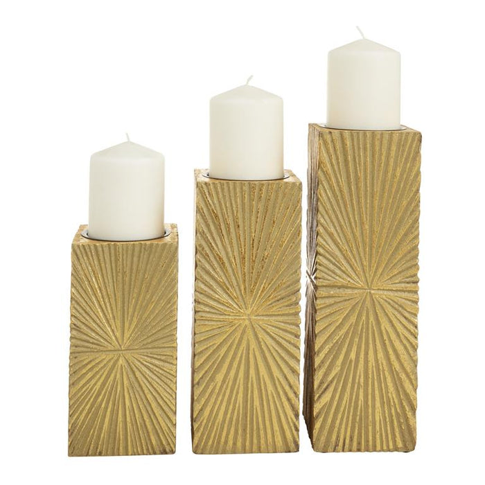 COSMOPOLITAN GOLD WOOD GEOMETRIC CARVED PILLAR CANDLE HOLDER, SET OF 3