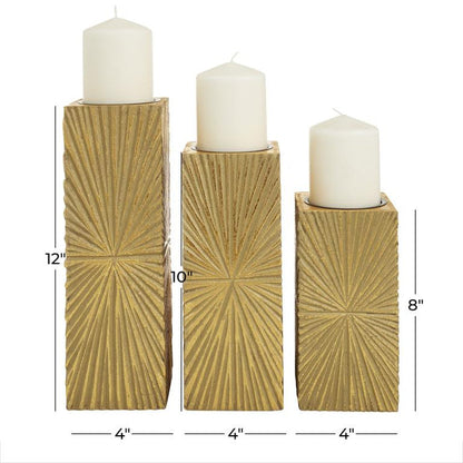 COSMOPOLITAN GOLD WOOD GEOMETRIC CARVED PILLAR CANDLE HOLDER, SET OF 3