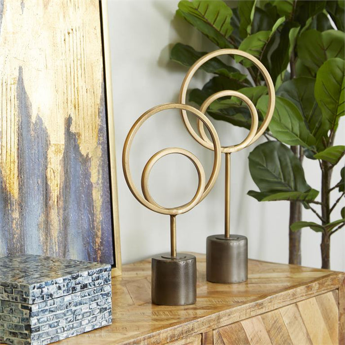 GOLD METAL GEOMETRIC CIRCLE SCULPTURE WITH BLACK BASE,